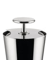 Polished metal tending box by Alessi with a sleek T-bar handle and side cut-outs revealing internal coils.