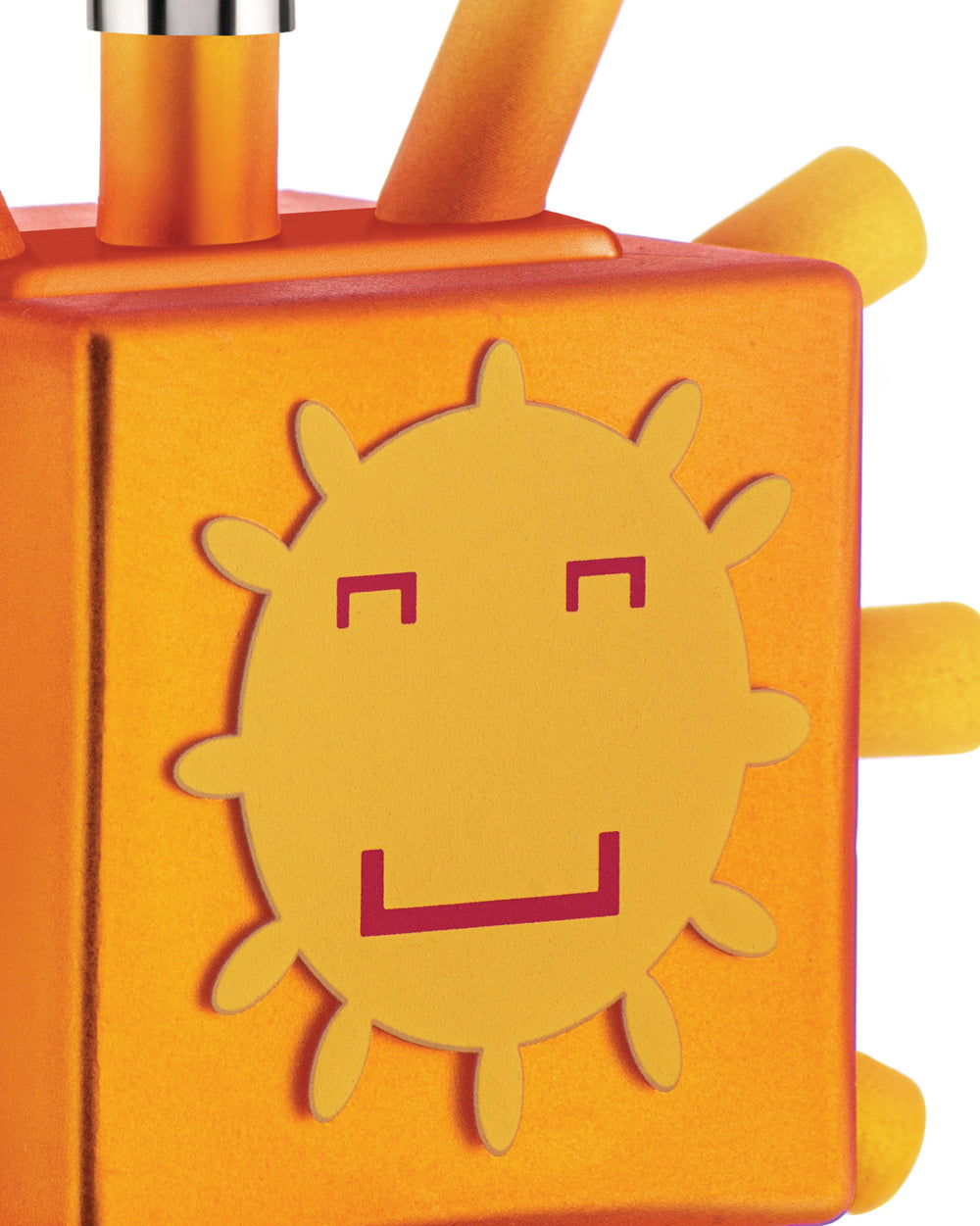 Orange textured Sunflake ornament by Alessi, with a yellow sun face and red pixelated features.