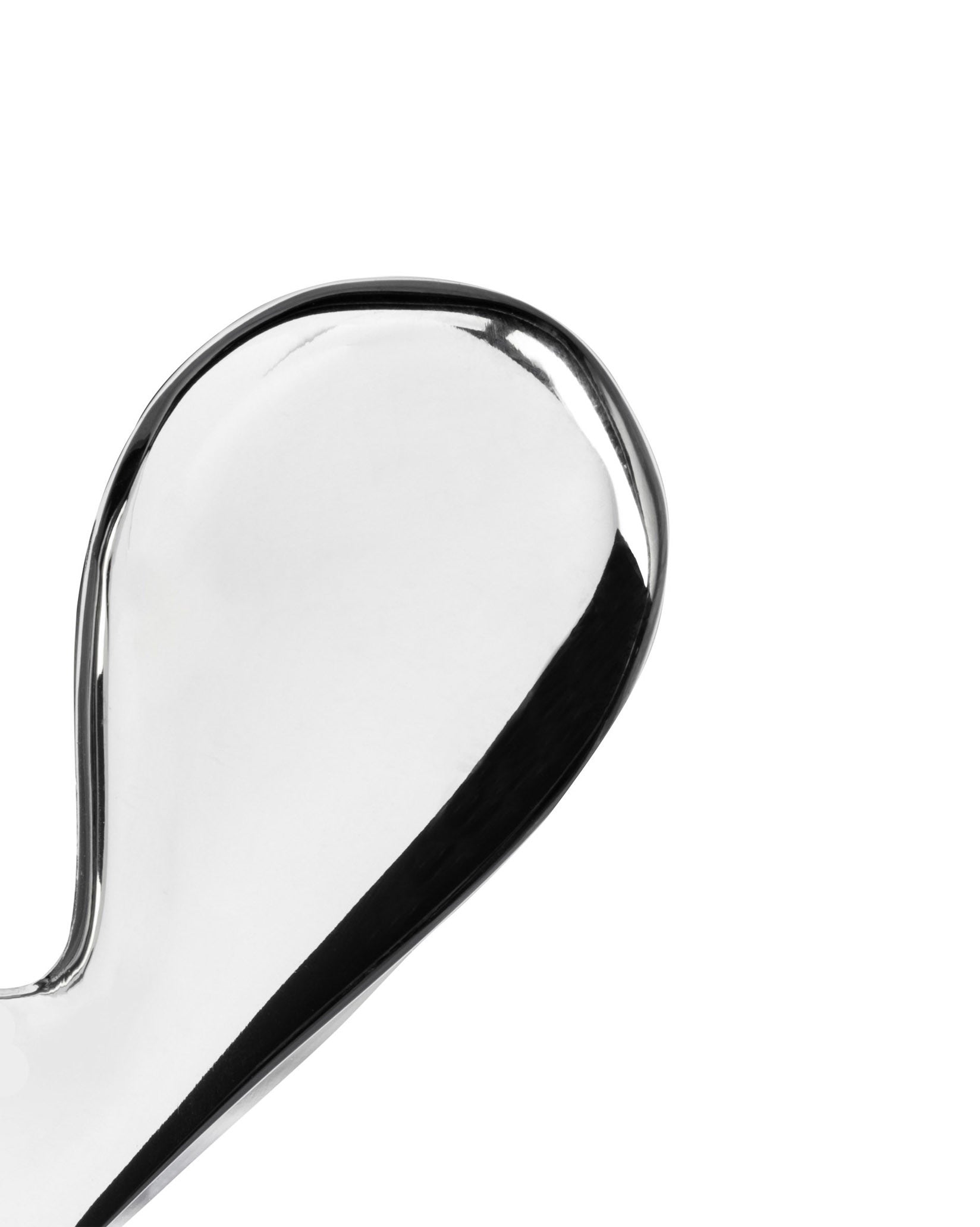 Polished silver-toned Nut Splitter by Alessi, with a smooth, curved, highly reflective surface, cropped against white.
