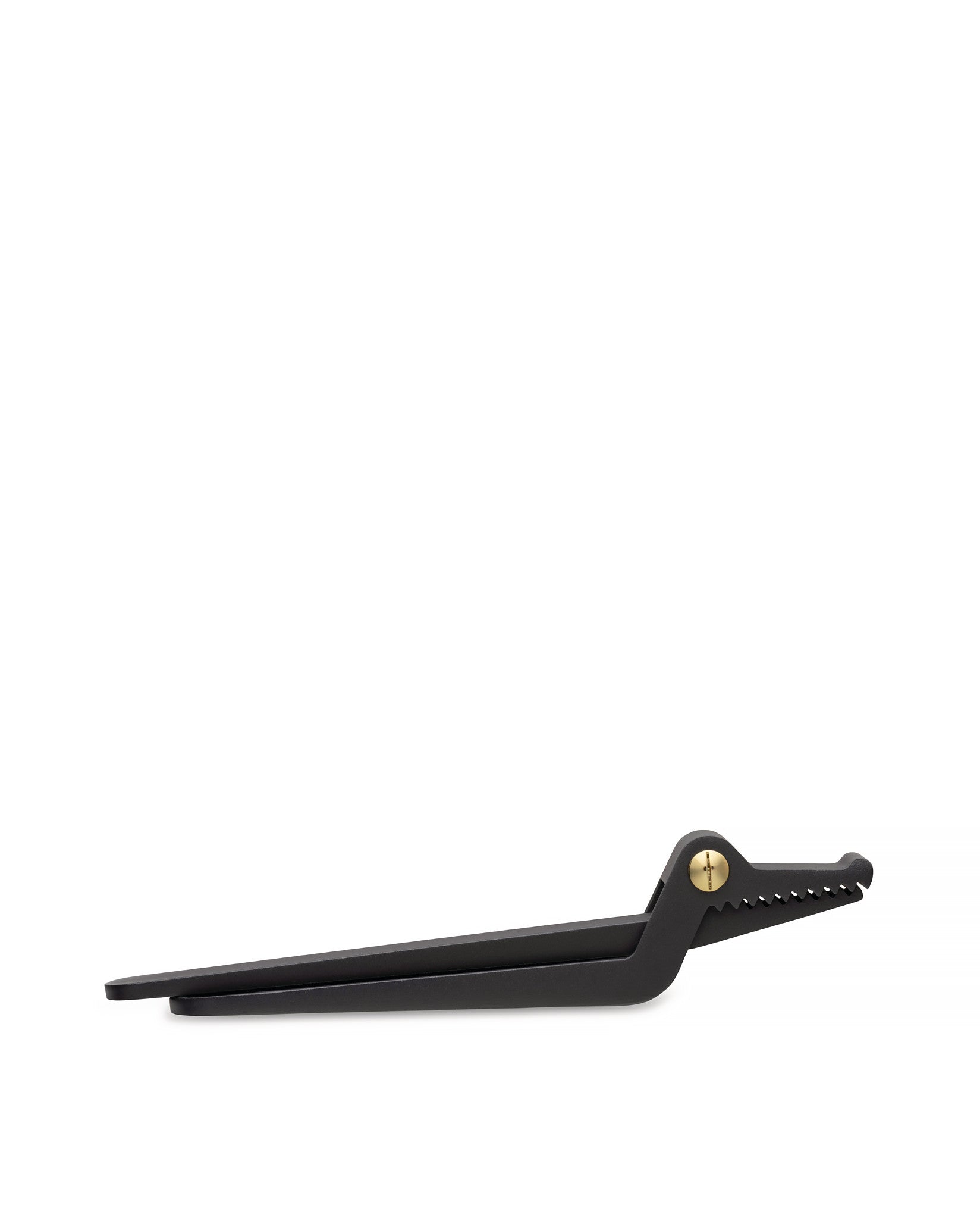Matte black alligator-shaped tongs by Alessi, with a gold pivot screw and serrated teeth, shown from the side.