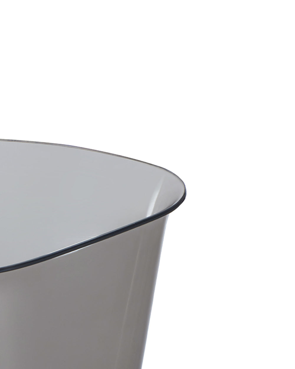 Translucent grey container by Alessi, with a smooth finish and curved dark rim, cropped view.