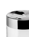 Clear glass storage jar by Alessi with a polished chrome wavy, sculptural lid.