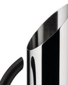 Silver stainless steel Tua Pitcher by Alessi with a sleek angled rim and black handle, cropped view.