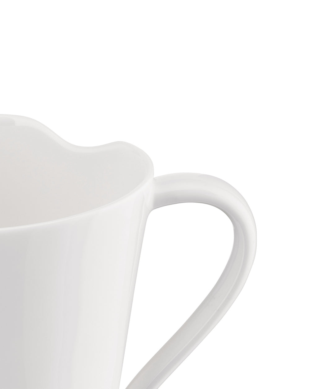 White ceramic cup by Alessi with a distinctive wavy rim and elegant handle, close-up.