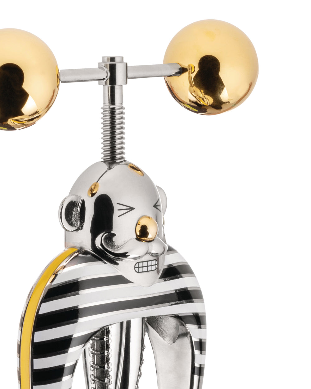 Polished metal Strongman corkscrew by Alessi with a striped black and white body, gold spheres, and a grinning face.