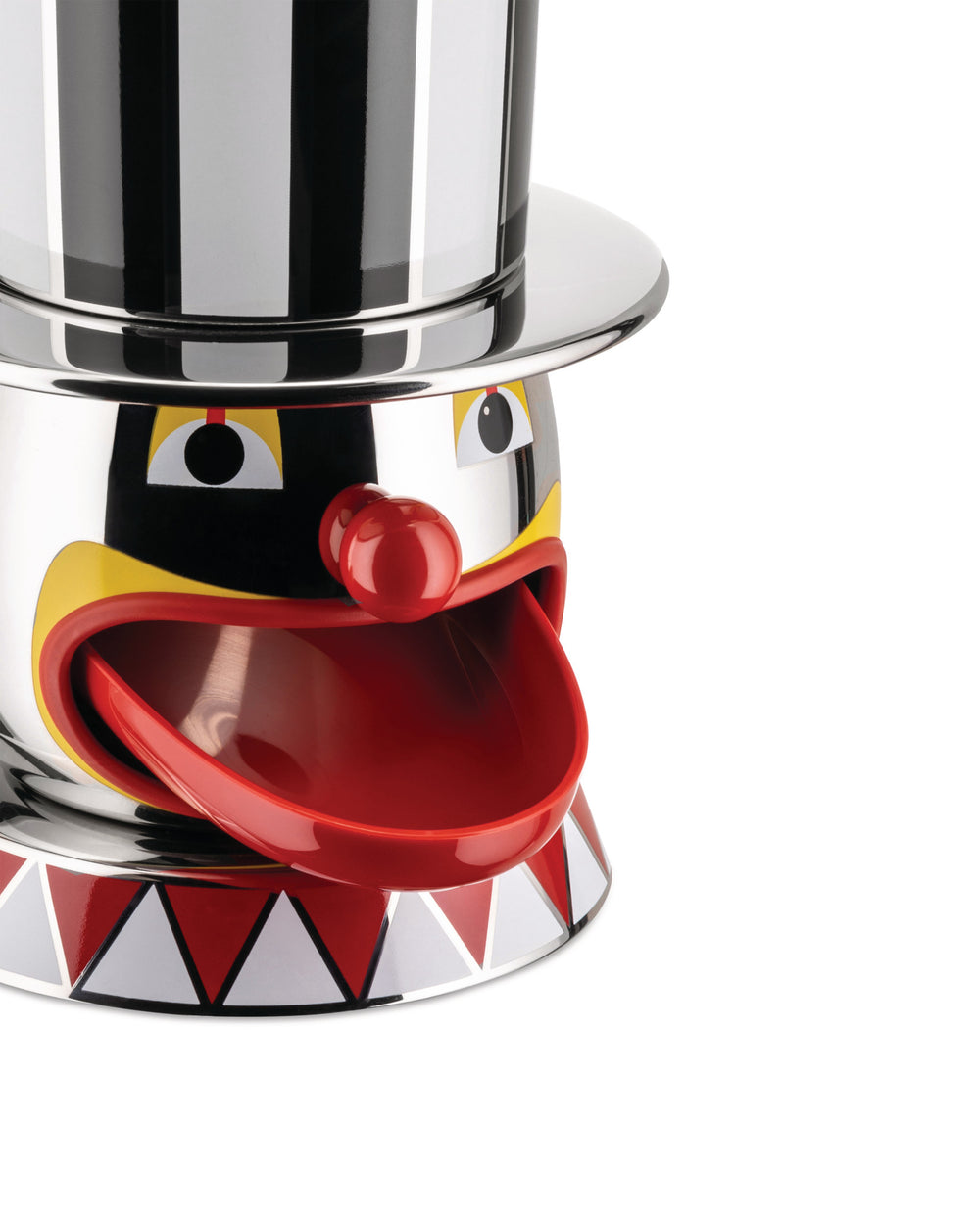 Metallic striped top hat candy dispenser by Alessi, with a clown face, red nose, red spoon tongue, and a triangular patterned base.