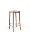 Tall wooden and chrome bar stool by Alessi, featuring a polished silver seat and circular footrest.