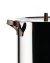 Glossy stainless steel cooking pot by Alessi with a matte brown curved handle and cylindrical lid knob, cropped side view.