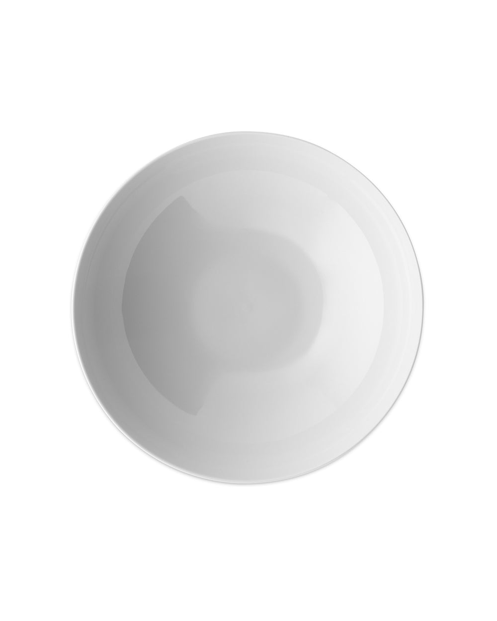 White ceramic bowl by Alessi from a top-down view, featuring a smooth, minimalist design with subtle reflections.