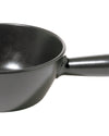 Matte black saucepan by Alessi with a glossy interior and handle, cropped view.