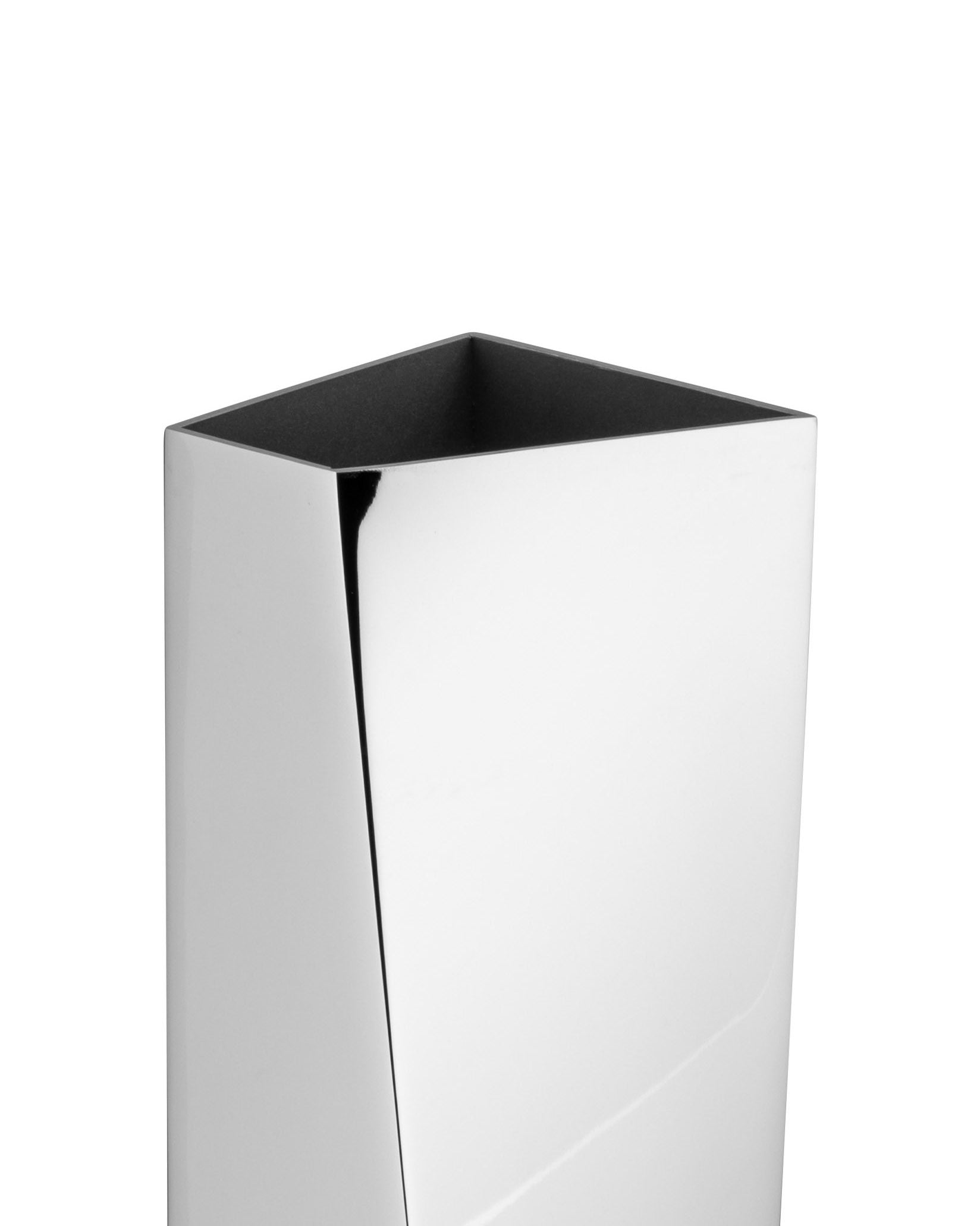 Polished silver vase by Alessi, featuring a deep vertical crevasse and a dark square opening.
