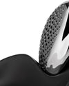 Silver metal grater by Alessi with a perforated surface, resting on a matte black base, close-up.