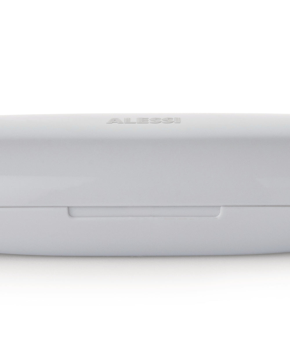 Light gray food container by Alessi, embossed with the brand logo and a visible lid seam.
