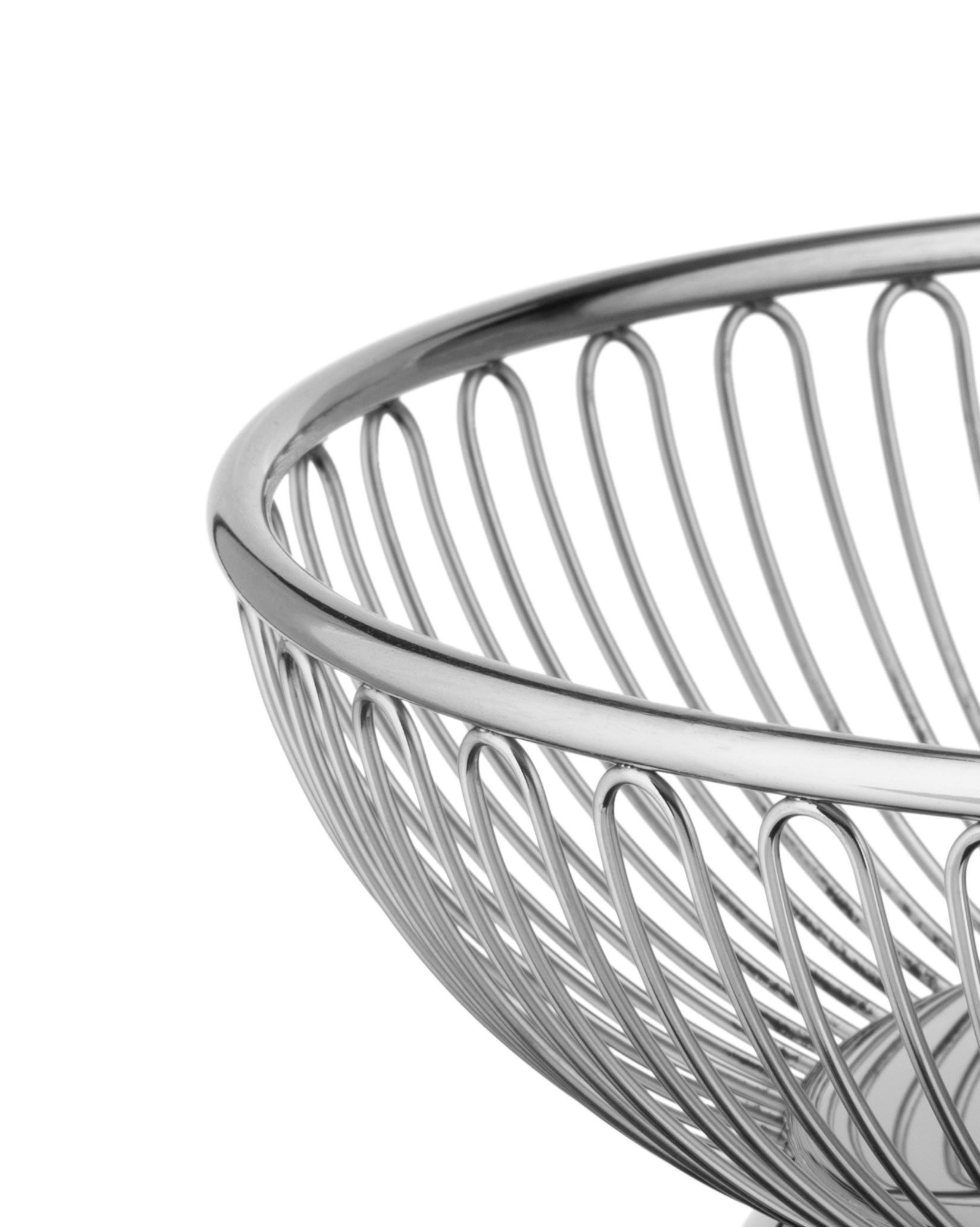 Silver metal fruit basket by Alessi with a polished top rim and curved wire design, shown cropped.