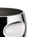 Cropped polished chrome vessel by Alessi, with a dark interior and undulating, sculptural exterior.