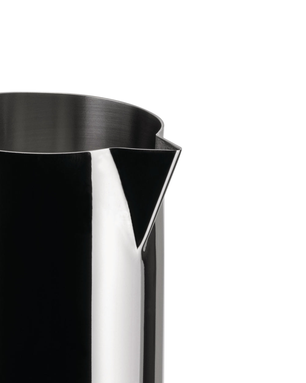 Polished metal creamer by Alessi with a sleek design and triangular pouring spout, cropped side view.