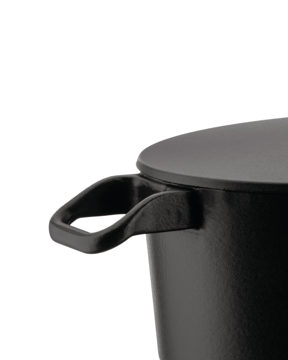 Black cooking pot with lid by Alessi, close-up showing a textured finish and short handles.