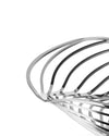 Silver-toned metal decorative bowl by Alessi with an abstract wavy open-work design of polished strips.