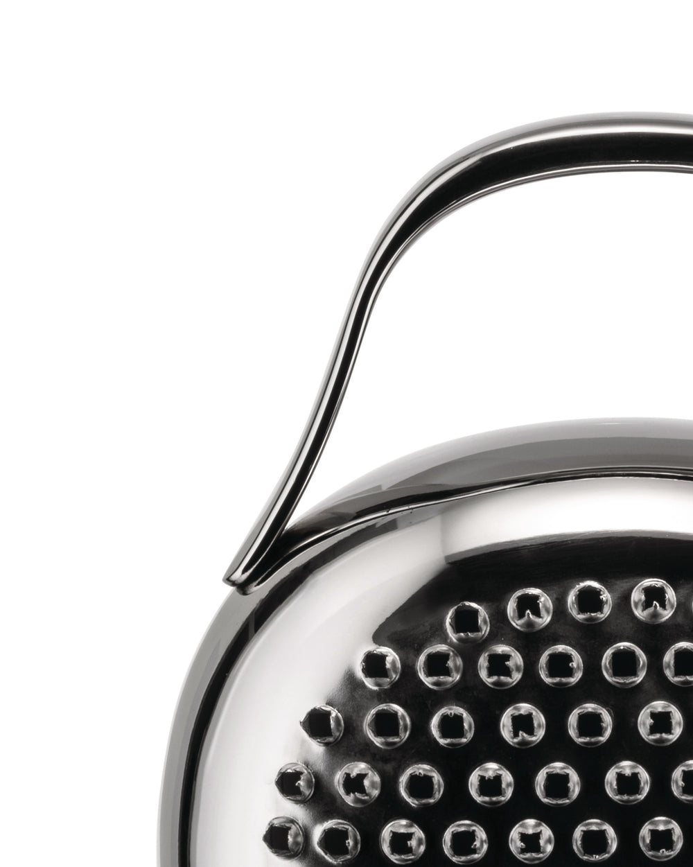 Silver metal cheese grater by Alessi, with a curved handle and perforated surface, close-up.