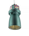 Teal green Christmas tree ornament bell by Alessi, with a colorful pixelated pattern, gold interior, and 'ALESSI E. SALMISTRO' inscription, hanging.