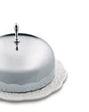 Silver metal cloche with handle and white ceramic plate by Alessi, featuring ornate embossed designs on both pieces.