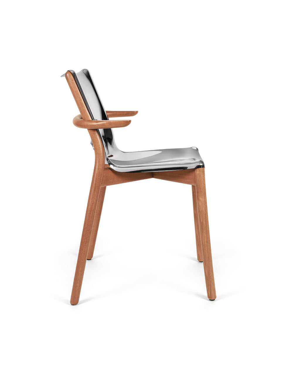 Sleek wooden and clear plastic chair by Alessi with integrated armrests, shown from the side.