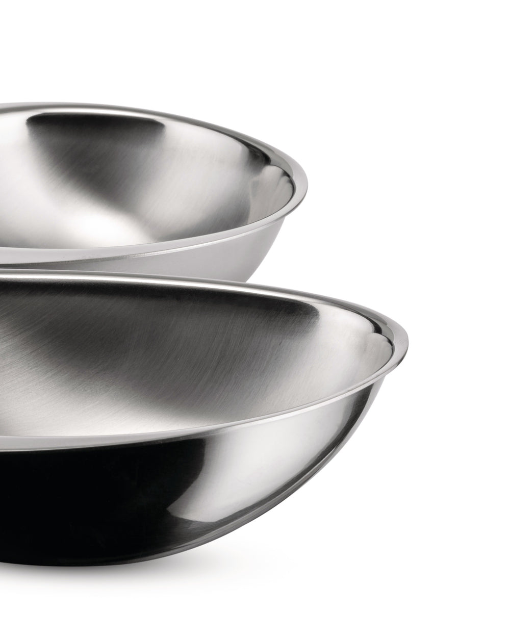 Two stainless steel bowls by Alessi with brushed interior and polished exterior, shown at an angle.