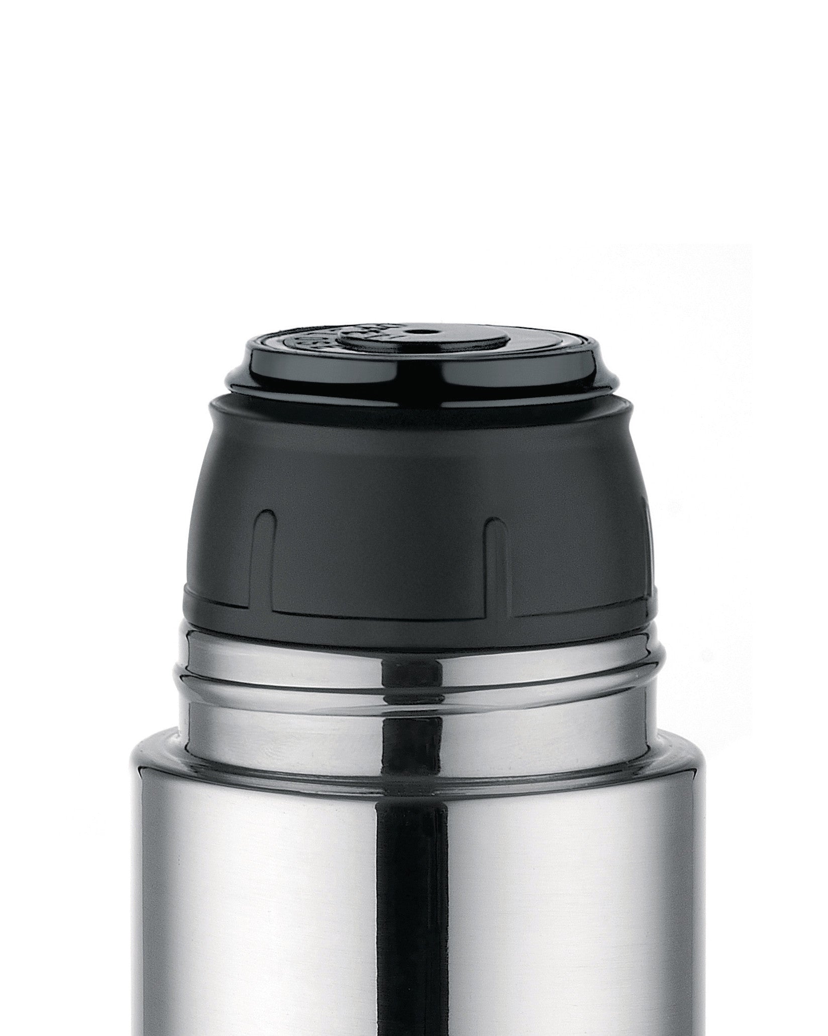 Silver stainless steel thermos by Alessi with a black textured cap, close-up view.