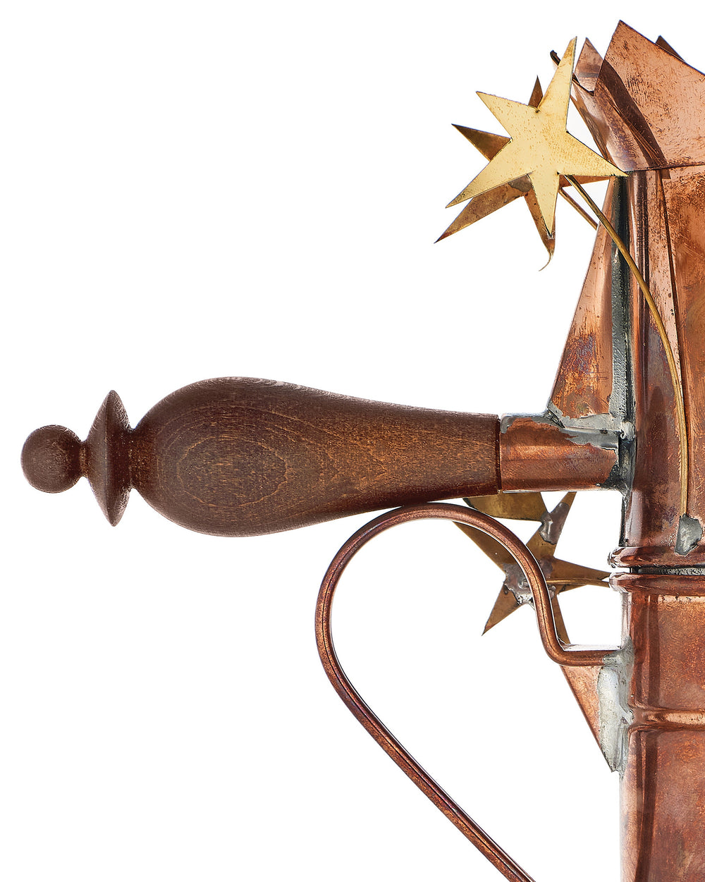 Copper coffee maker with a wooden handle by Alessi, featuring star and heart-shaped decorative elements.