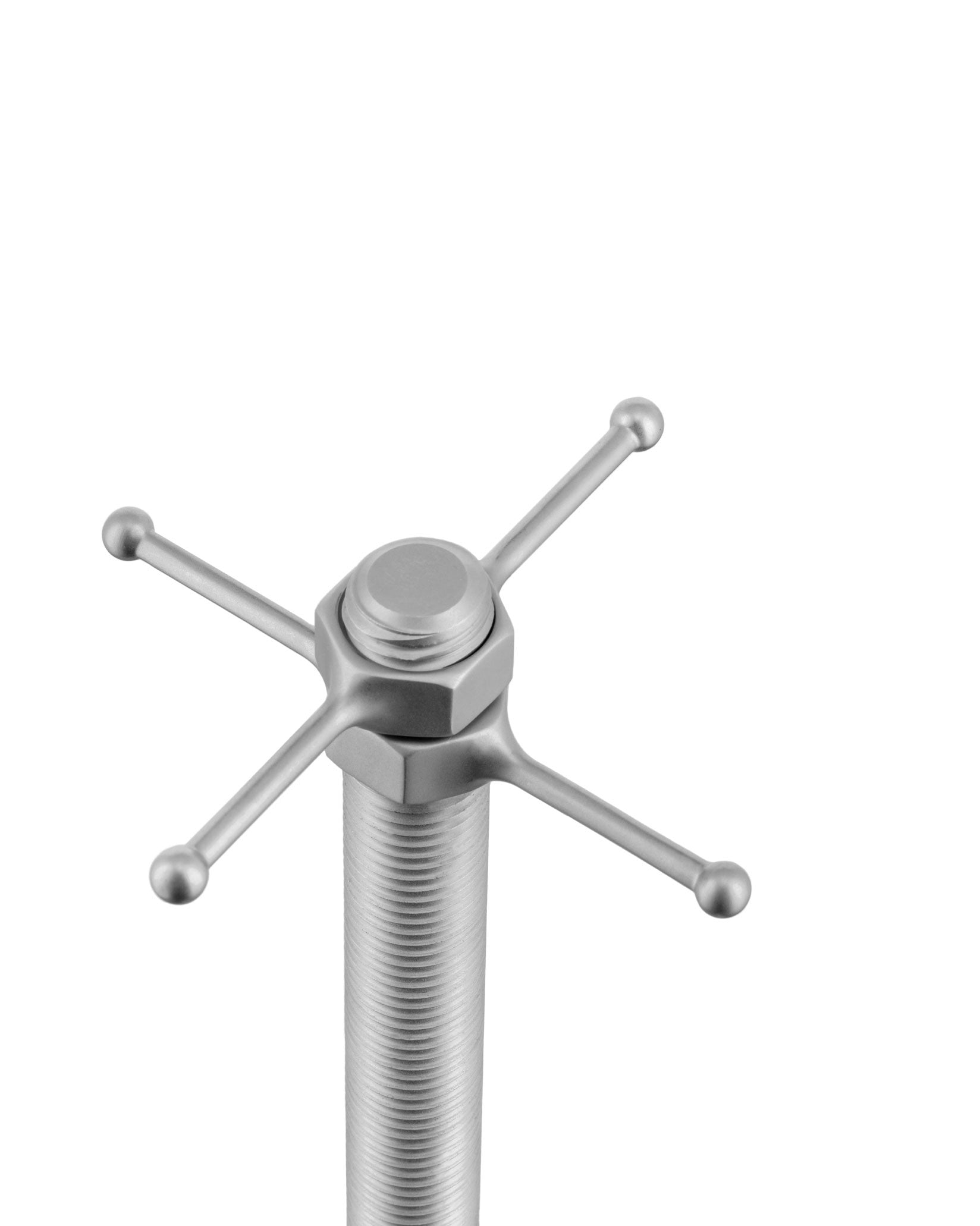 Silver threaded metal object by Alessi with a four-pronged handle and ball-shaped tips.