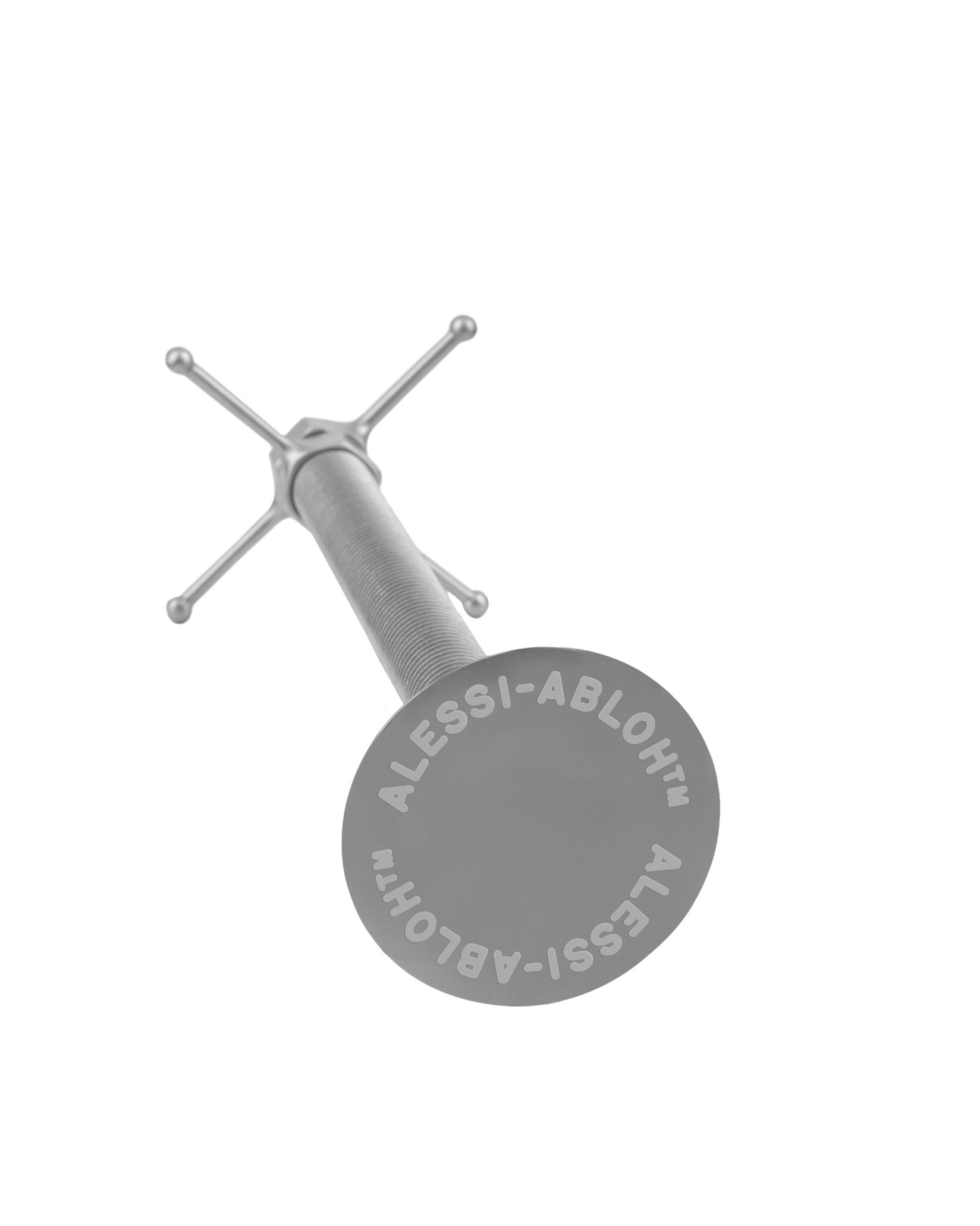 Silver threaded mechanical object by Alessi with a four-pronged top, inscribed 'ALESSI-ABLOH™' on its round base.