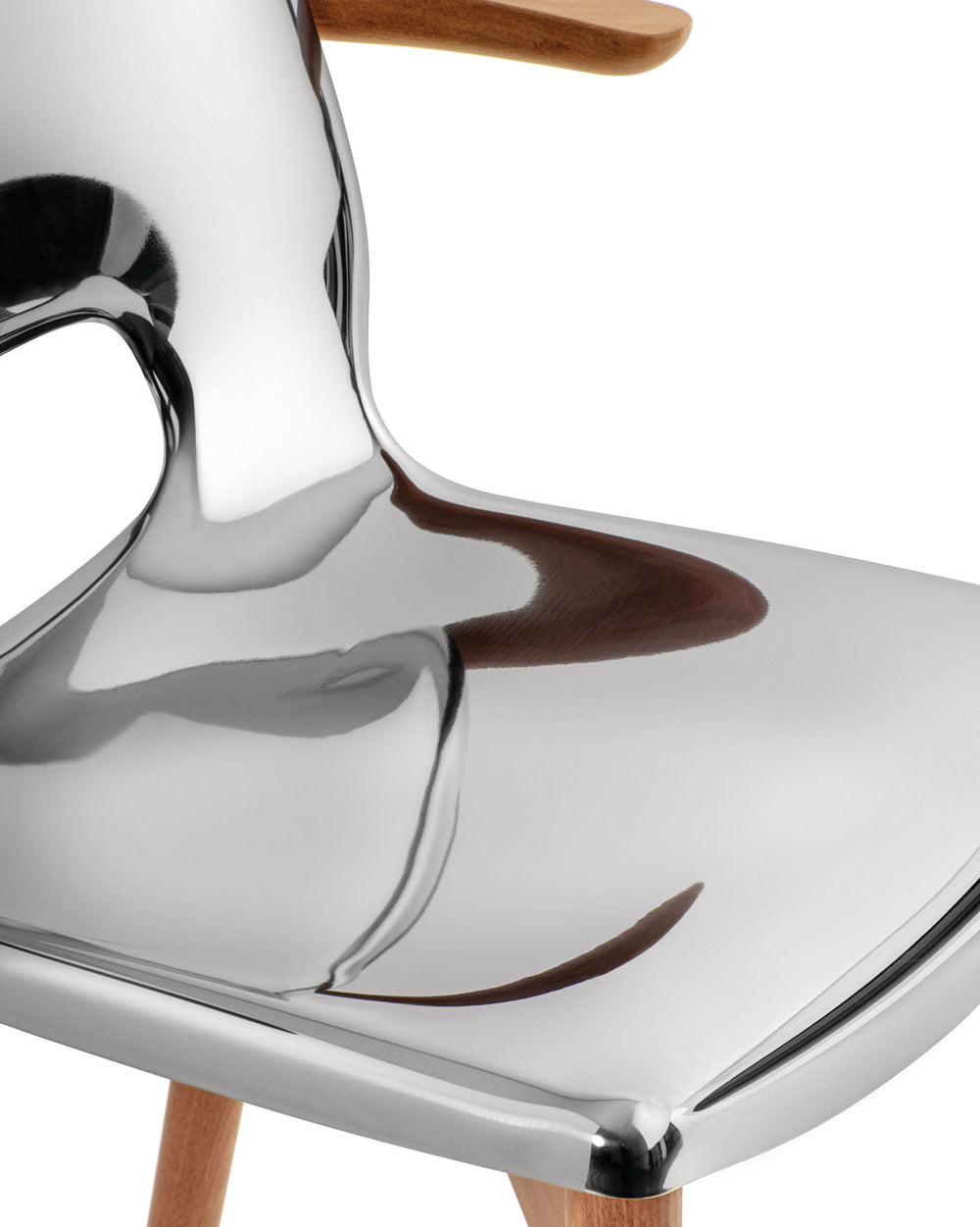 Shiny chrome chair by Alessi with a curved backrest, wooden armrest, and wooden leg, cropped.