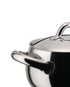 Shiny stainless steel pot by Alessi with integrated handles, shown in a cropped close-up.
