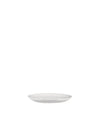White saucer by Alessi, a simple, round design with a slight rim, shown from a straight-on side view.