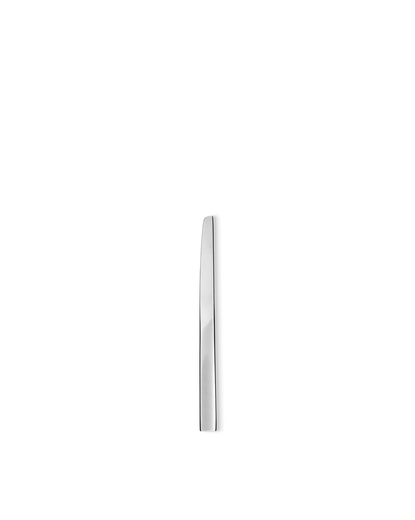 Silver metal butter knife by Alessi, with a sleek handle and a finely serrated edge.