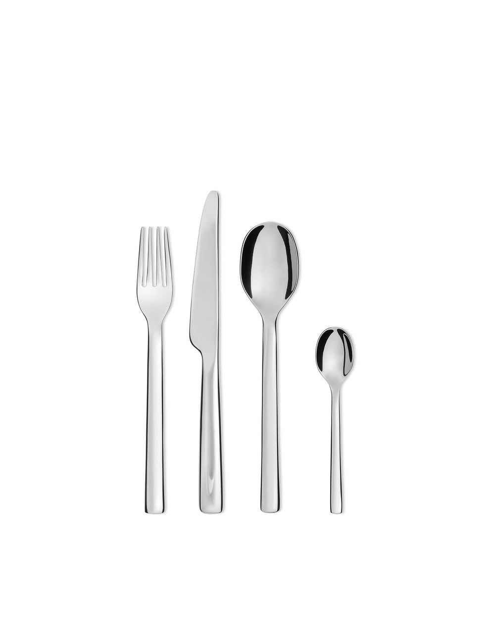 Silver-toned metal cutlery set by Alessi, including a fork, knife, large spoon, and small spoon on white.