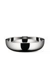 Polished stainless steel bowl by Alessi, wide and shallow with a highly reflective surface.
