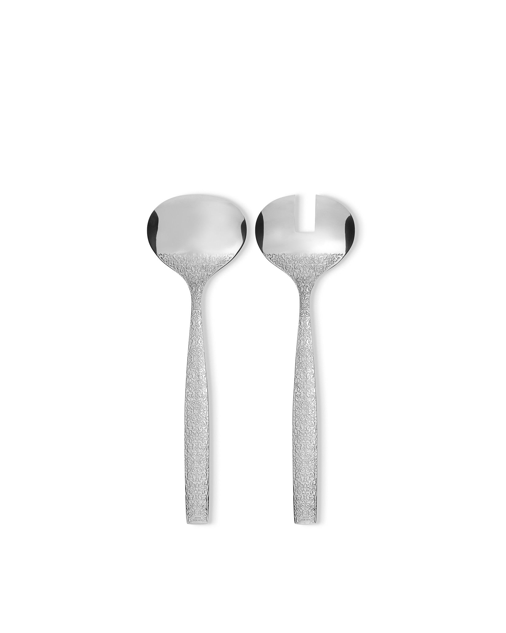 Silver-toned salad server set by Alessi with an intricate embossed pattern on the handles.