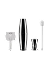 Polished silver stainless steel cocktail shaker set by Alessi, with jigger, strainer, and stirring spoon on white.