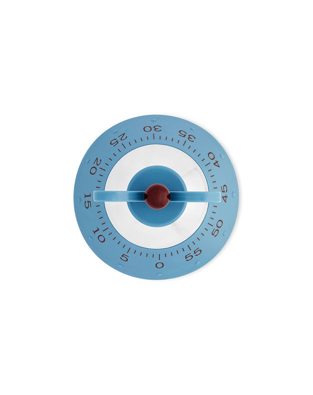 Blue round Kitchen Timer by Alessi with a white face, red knob, and minute markings.