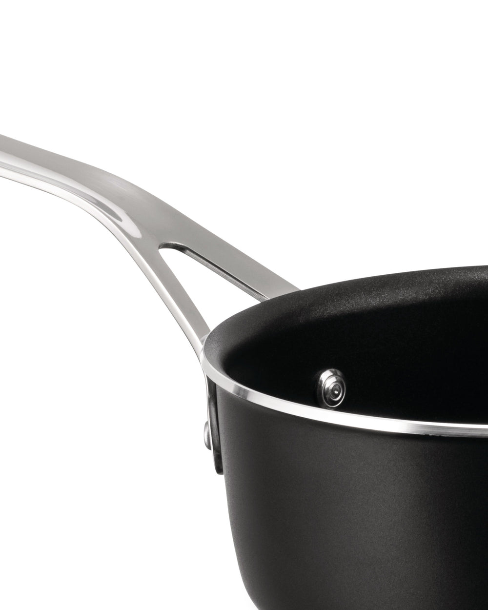 Black non-stick saucepan by Alessi with a polished silver-tone handle, shown in a cropped side view.