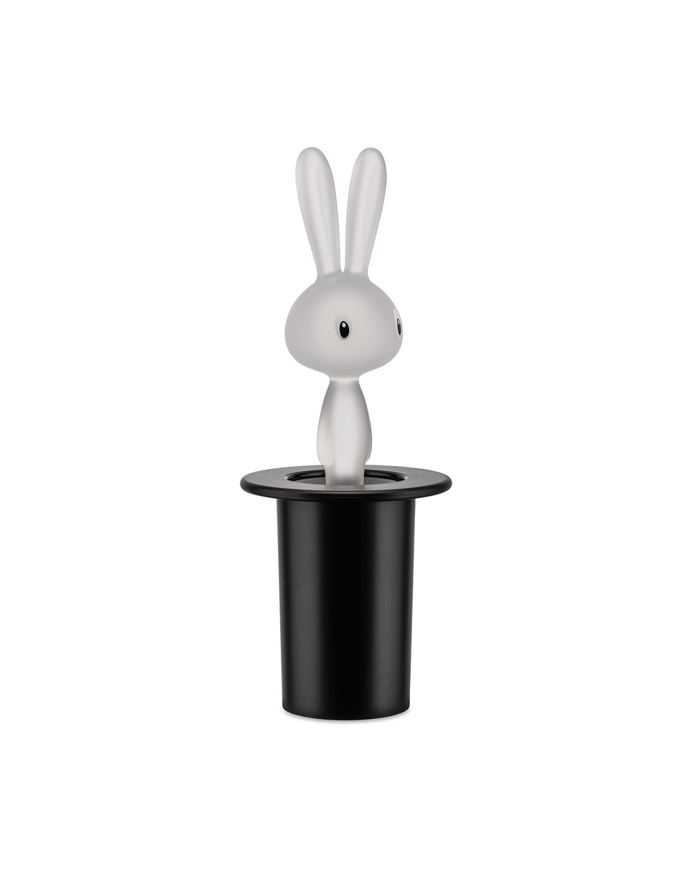 White translucent rabbit figurine by Alessi, with black eyes and long ears, emerging from a matte black top hat.