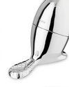 Angled view of a chrome-plated beaver-shaped object by Alessi, featuring 'Victoria' text, a shoe icon, and a grid-patterned tail.