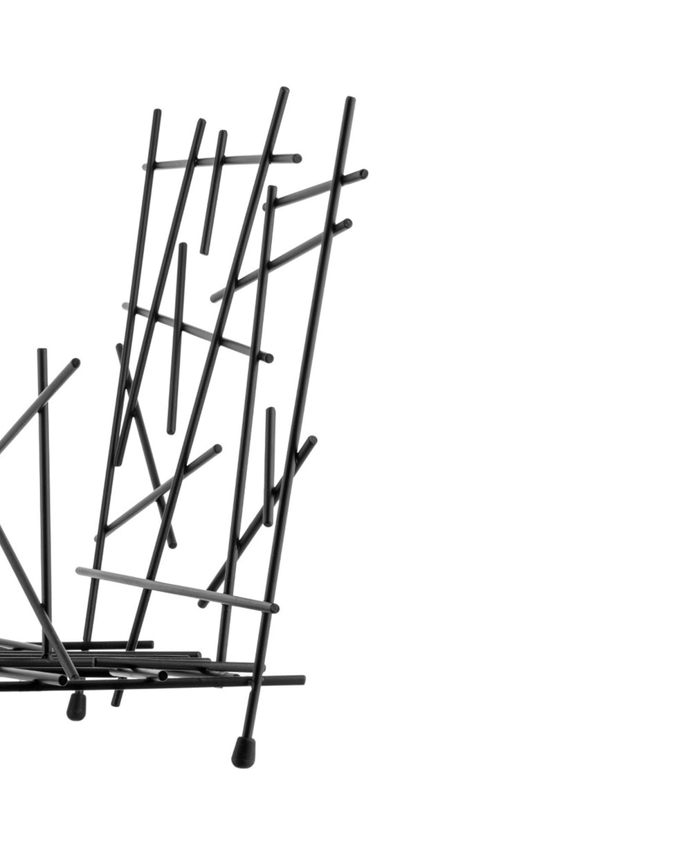 Black metal fruit bowl by Alessi, featuring an abstract arrangement of intersecting rods and small rounded feet, cropped.