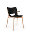 Black and light wood chair by Alessi with a sleek design and small wooden armrests.