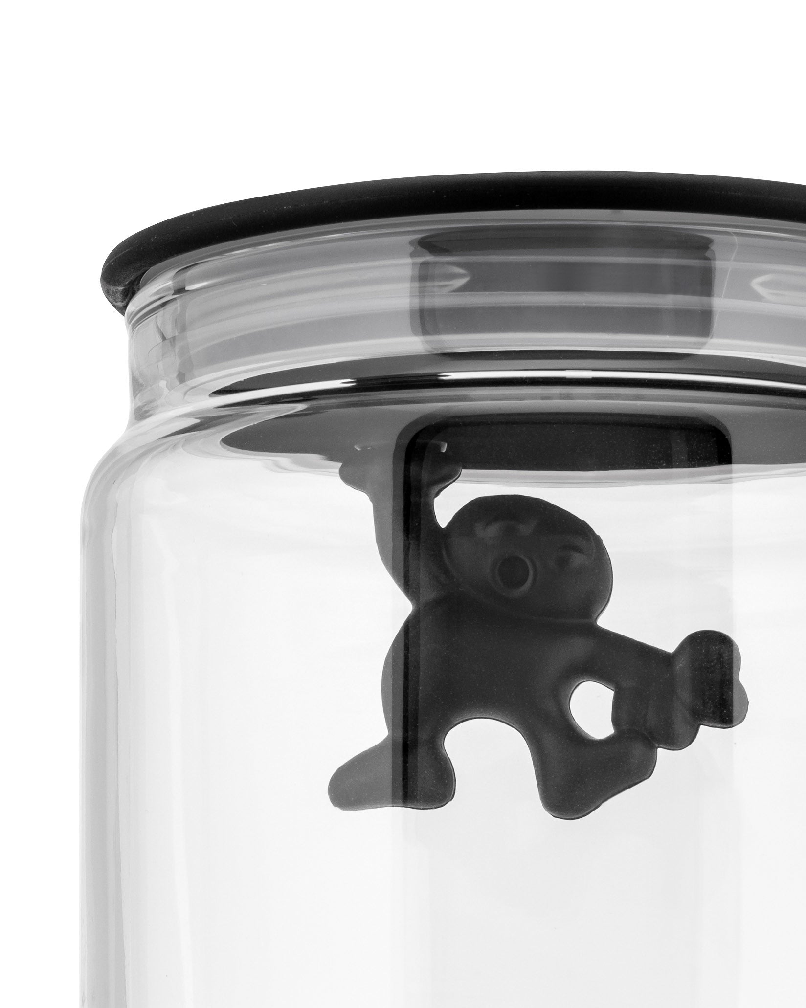 Clear glass storage jar by Alessi featuring a black 'Gianni' figure hanging inside from the lid.
