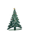 Dark green metal Christmas tree decoration by Alessi, with wavy bark-like cutouts, a gold star, and multicolored ball ornaments on an oval base.