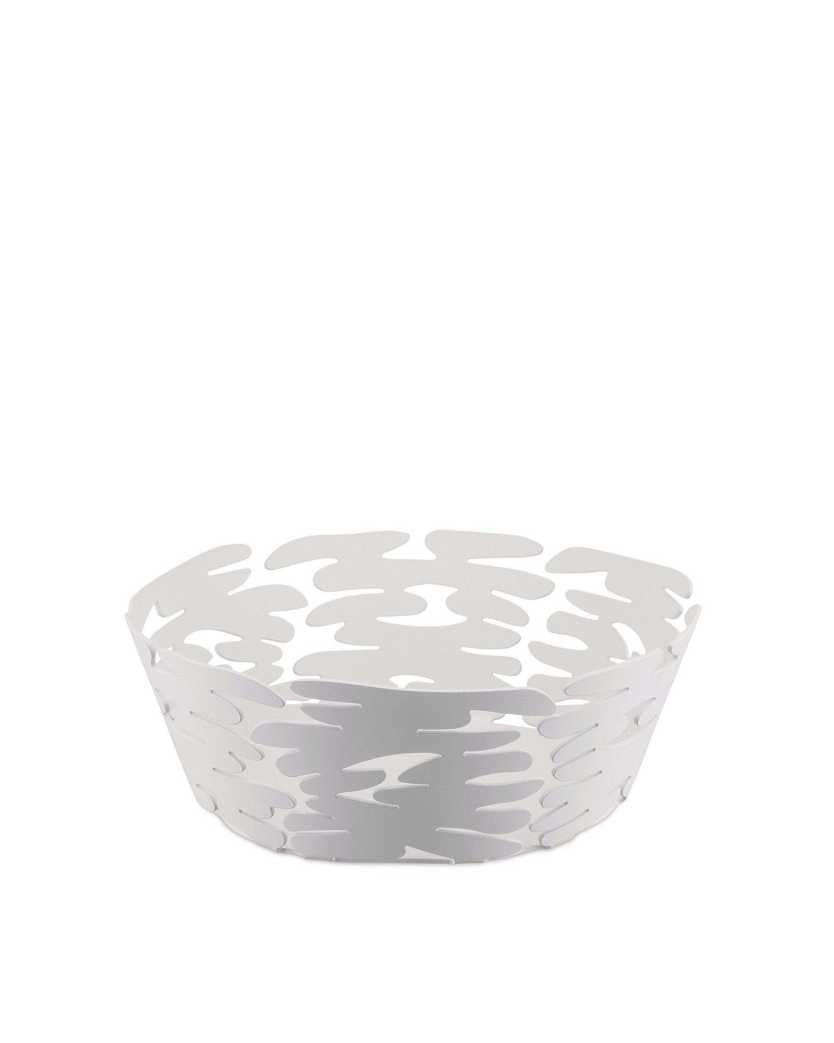 White decorative basket by Alessi with an abstract cut-out pattern on a white background.