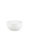 White fruit bowl by Alessi with an intricate cutout cactus leaf pattern.