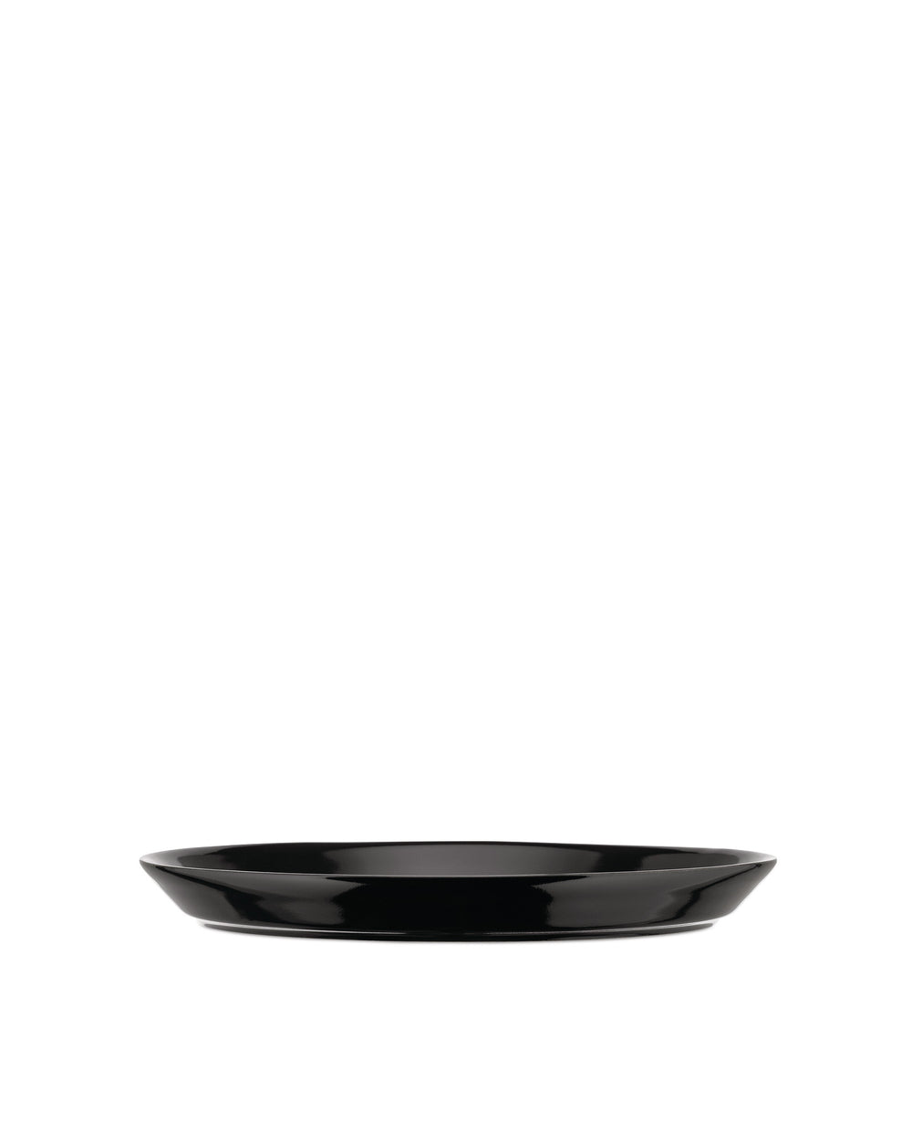 Black shallow serving plate by Alessi with a glossy finish and subtly curved sides.
